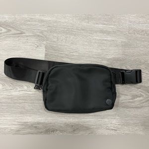 Black hip pack / sling bag